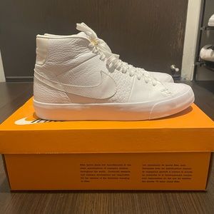 Nike Blazer Royal Q’s in triple white. Men’s 9.5 and Women’s 11.